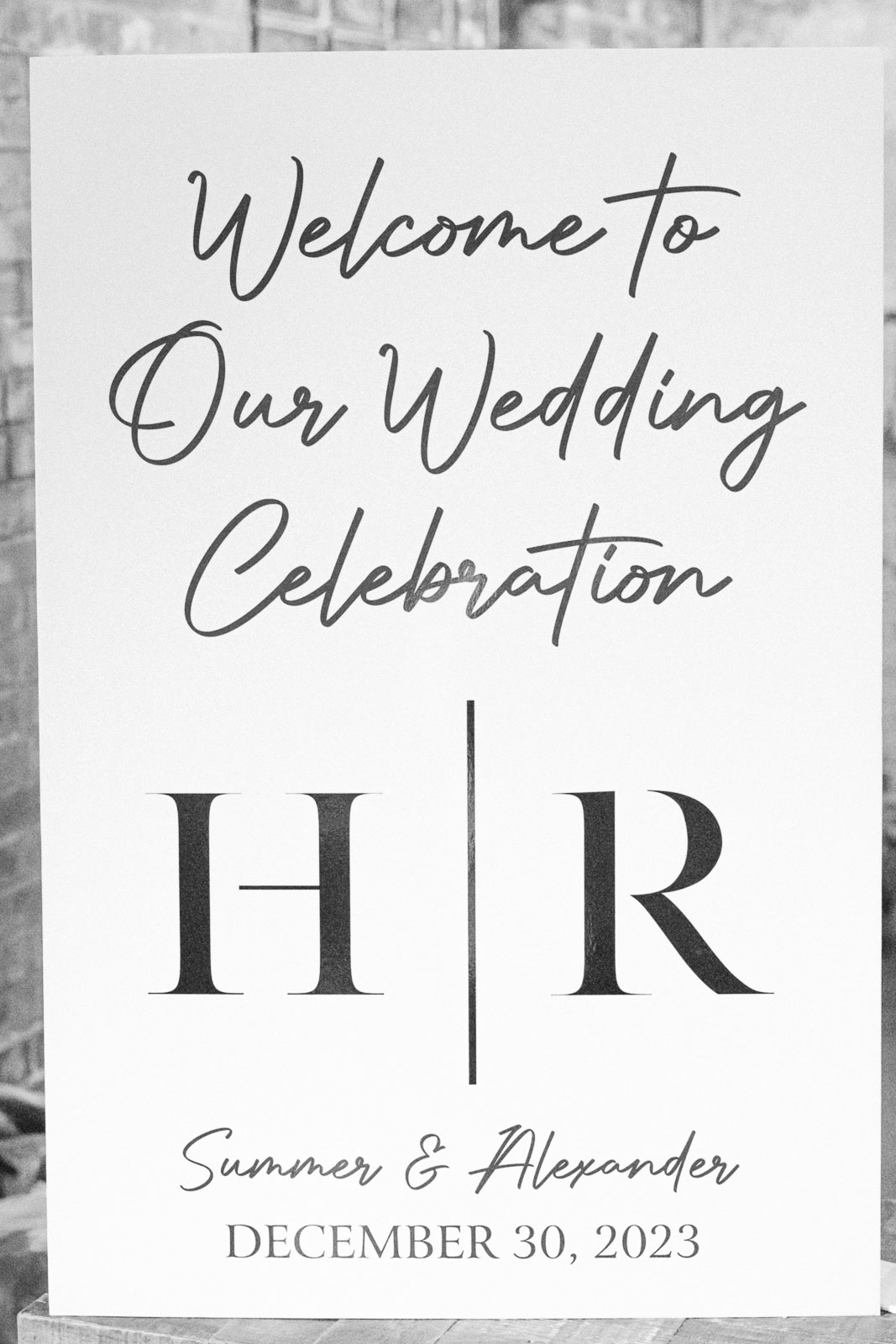 Details of a wedding sign in black and white